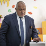 
              Former Bulgarian Prime Minister Boyko Borisov casts his ballot in the town of Bankya, Bulgaria, Sunday, Oct. 2, 2022. Bulgarians on Sunday cast their ballots in a general election marked by a raging war nearby, political instability, and economic hardships in the European Union’s poorest member. (AP Photo/Visar Kryeziu)
            