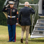 
              President Joe Biden boards Marine One on the South Lawn at the White House in Washington, Monday, Oct. 3, 2022, for a short trip to Andrews Air Force Base, Md., and then on to Puerto Rico. (AP Photo/Andrew Harnik)
            