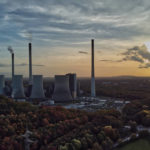 
              FILE - The sun sets behind the cole-fired power plant 'Scholven' of the Uniper energy company in Gelsenkirchen, Germany, Oct. 22, 2022. Europe's sky-high natural gas prices have fallen thanks to unseasonably warm weather and efforts to fill up storage ahead of winter. Prices have fallen to their lowest level since June and electricity is cheaper, too. Lower use by industry has helped to reduce demand for fuel as well. (AP Photo/Michael Sohn, File)
            