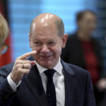 
              German Chancellor Olaf Scholz, center, gestures as he talks to members of the 'Alliance For Transformation' summit at the Chancellery in Berlin, Germany, Tuesday, Oct. 18, 2022. (AP Photo/Michael Sohn, pool)
            