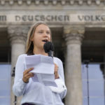 
              FILE --Swedish climate activist Greta Thunberg holds a speech during a Fridays for Future global climate strike in front of a parliament building in Berlin, Germany, Friday, Sept. 24, 2021. Climate activist Greta Thunberg says it would be “a mistake” for Germany to switch off its nuclear power plants if that means burning more planet-heating coal.  (AP Photo/Michael Sohn,file)
            