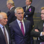 
              NATO Secretary General Jens Stoltenberg, center, speaks with European Union foreign policy chief Josep Borrell, left, and Finland's Defense Minister Antti Kaikkonen during a meeting of NATO defense ministers at NATO headquarters in Brussels, Thursday, Oct. 13, 2022. NATO Defence Ministers are meeting in Brussels Thursday as the military alliance presses ahead with plans to hold a nuclear exercise next week as concerns deepen over President Vladimir Putin's insistence that he will use any means necessary to defend Russian territory. (AP Photo/Olivier Matthys)
            