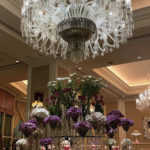 
              This photo provided to The Associated Press shows a chandelier and fresh flowers in the lobby of the Four Seasons Damascus hotel in February 2021. World Health Organization Syria leader Dr. Akjemal Magtymova organized a party here in May 2021, when she received a leadership award from Tufts University, her alma mater. Held at this exclusive hotel in Damascus, the party included a guest list of about 50, at a time when fewer than 1% of the Syrian population had received a single dose of COVID-19 vaccine. (AP Photo)
            