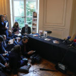 
              French author Annie Ernaux, right, gives a press conference after being awarded 2022's Nobel Prize in literature, in Paris, Thursday, Oct. 6, 2022. The 82-year-old was cited for "the courage and clinical acuity with which she uncovers the roots, estrangements and collective restraints of personal memory," the Nobel committee said. (AP Photo/Michel Euler)
            