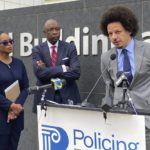 
              Comedian Eric André, right, speaks at a news conference outside the federal courthouse in Atlanta on Tuesday, Oct. 11, 2022, as his attorneys Allegra Lawrence-Hardy, left, and Richard Deane watch. André and comedian Clayton English filed a lawsuit Tuesday alleging that they were racially profiled and illegally stopped by Clayton County police at Hartsfield-Jackson Atlanta International Airport. They say officers singled them out during separate stops roughly six months apart because they are Black and grilled them about drugs as other passengers watched. (AP Photo/Kate Brumback)
            