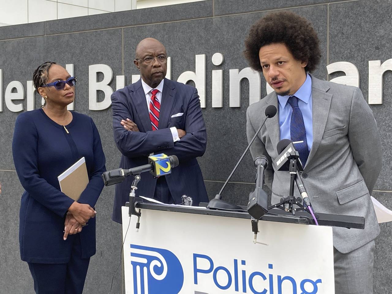 Comedian Eric André, right, speaks at a news conference outside the federal courthouse in Atlanta ...