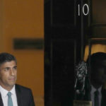 
              Britain's Prime Minister Rishi Sunak leaves 10 Downing Street for the House of Commons for his first Prime Minister's Questions in London, Wednesday, Oct. 26, 2022. Sunak was elected by the ruling Conservative party to replace Liz Truss who resigned. (AP Photo/Frank Augstein)
            