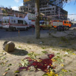 
              A view of blood on the ground at the scene of Russian shelling, in Kyiv, Ukraine, Monday, Oct. 10, 2022. Multiple explosions rocked Kyiv early Monday following months of relative calm in the Ukrainian capital. Kyiv Mayor Vitali Klitschko reported explosions in the city's Shevchenko district, a large area in the center of Kyiv that includes the historic old town as well as several government offices. (AP Photo/Efrem Lukatsky)
            