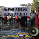 
              Protesters hold a banner that reads, "who sows misery reaps anger" during a demonstration, in Nantes, western France, Tuesday, Oct. 18, 2022. Industries across France went on strike Tuesday to push for pay hikes that keep up with rising inflation, ramping up the clash between workers and the government after weeks of walkouts that hobbled oil refineries and sparked gasoline shortages around the country. (AP Photo/Jeremias Gonzalez)
            