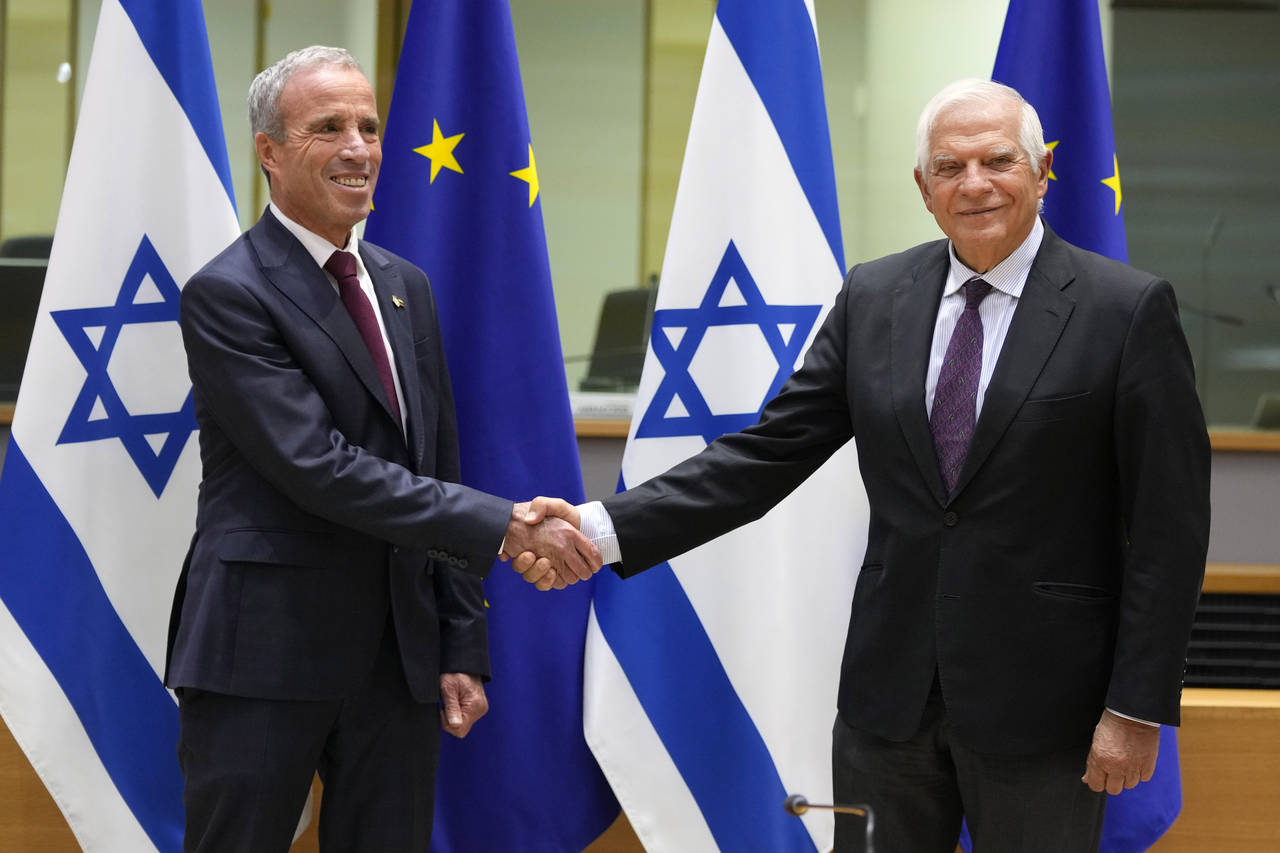 European Union foreign policy chief Josep Borrell, right, greets Israel's Minister of Intelligence ...
