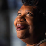 
              India Scott poses for a photo in her home in New Orleans, Monday, Oct. 10, 2022. Activists, advocates, researchers and people living with disabilities say not enough is being done to include disabled people in climate action planning and policy, or disaster relief and recovery efforts. (AP Photo/Gerald Herbert)
            