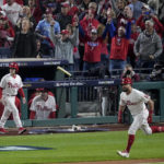 
              Philadelphia Phillies' Kyle Schwarber celebrates his home run during the first inning in Game 3 of the baseball NL Championship Series between the San Diego Padres and the Philadelphia Phillies on Friday, Oct. 21, 2022, in Philadelphia. (AP Photo/Matt Rourke)
            