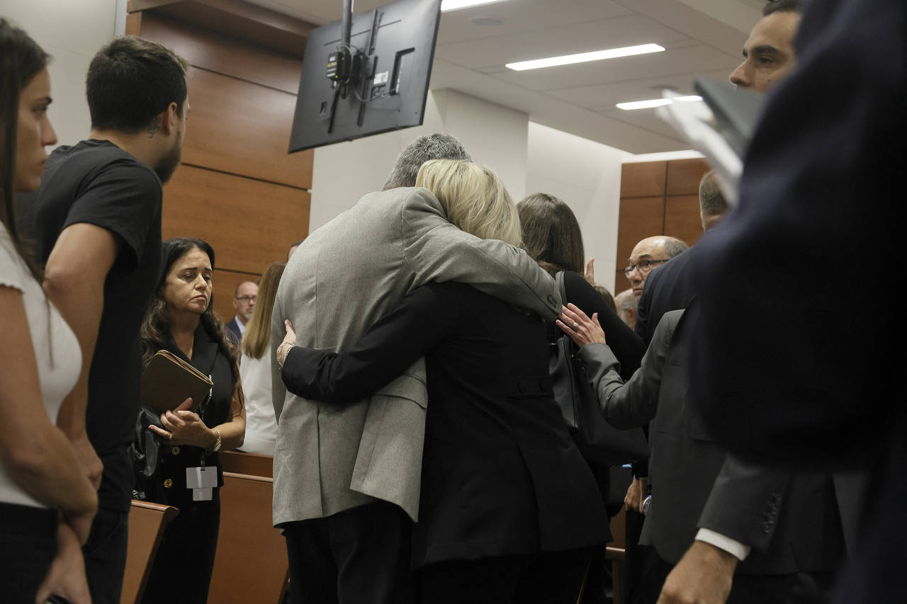 Tom and Gena Hoyer exit the courtroom as Gena could be heard sobbing following the verdict in the t...