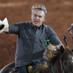 
              FILE - Brazilian President Jair Bolsonaro, who is running for a second term, rides a horse at the the Barretos Rodeo International Festival in Barretos, Sao Paulo state Brazil, Friday, Aug. 26, 2022. As Brazilians get ready to head to the polls on Oct. 2, corruption is no longer at the forefront of their minds even as Bolsonaro repeatedly tries to remind voters of the presidential front runner's convictions, repeatedly calling former President Luiz Inacio Lula da Silva an “ex-inmate” and “thief.”  (AP Photo/Andre Penner, File)
            