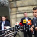 
              France's President Emmanuel Macron speaks with the media as he arrives for a meeting of the European Political Community at Prague Castle in Prague, Czech Republic, Thursday, Oct 6, 2022. Leaders from around 44 countries are gathering Thursday to launch a "European Political Community" aimed at boosting security and economic prosperity across the continent, with Russia the one major European power not invited. (AP Photo/Petr David Josek)
            