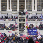 FILE - Insurrectionists loyal to President Donald Trump breach the Capitol in Washington, Jan. 6, 2021. (AP Photo/John Minchillo, File)