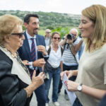 
              European Parliament, Roberta Metsola, meets Maria Falcone, sister of judge Giovanni Falcone killed by the Sicilian Mafia in May 1992, at the same place where Daphne Caruana Galizia was killed in Bidnija fields, Malta, Sunday, Oct. 16, 2022. Malta on Sunday marked the fifth anniversary of the car bomb slaying of investigative journalist Daphne Caruana Galizia, just two days after two key suspects reversed course and pleaded guilty to the murder on the first day of their trial. (AP Photo/Rene' Rossignaud)
            