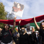 
              Demonstrators chant as they protest against the Iranian regime, in Washington, Saturday, Oct. 22, 2022, following the death of Mahsa Amini in the custody of the Islamic republic's notorious "morality police." (AP Photo/Jose Luis Magana)
            
