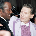 
              CORRECTS LOCATION OF DEATH TO DESOTO COUNTY, MISSISSIPPI - FILE - Chuck Berry, left, and Jerry Lee Lewis embrace at a reception at the Waldorf-Astoria in New York on Jan. 23, 1986. Spokesperson Zach Furman said Lewis died Friday morning, Oct. 28, 2022, at his home in DeSoto County, Miss., south of Memphis, Tenn. He was 87. (AP Photo/G. Paul Burnett, File)
            
