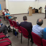 
              David Clements, a New Mexico-based former prosecutor and former college professor, speaks to an audience at a public library auditorium in Albuquerque, N.M., Sept. 3, 2022. At conventions, church gatherings and local forums, Clements advocates for eliminating electronic election equipment and exonerating many of the defendants charged in the violent Jan. 6, 2021, attack on the U.S. Capitol. (AP Photo/Morgan Lee)
            