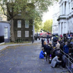 
              Journalists wait outside Downing Street in London, Monday, Oct. 24, 2022. Former British Treasury chief Rishi Sunak is frontrunner in the Conservative Party's race to replace Liz Truss as prime minister. (AP Photo/Kirsty Wigglesworth)
            