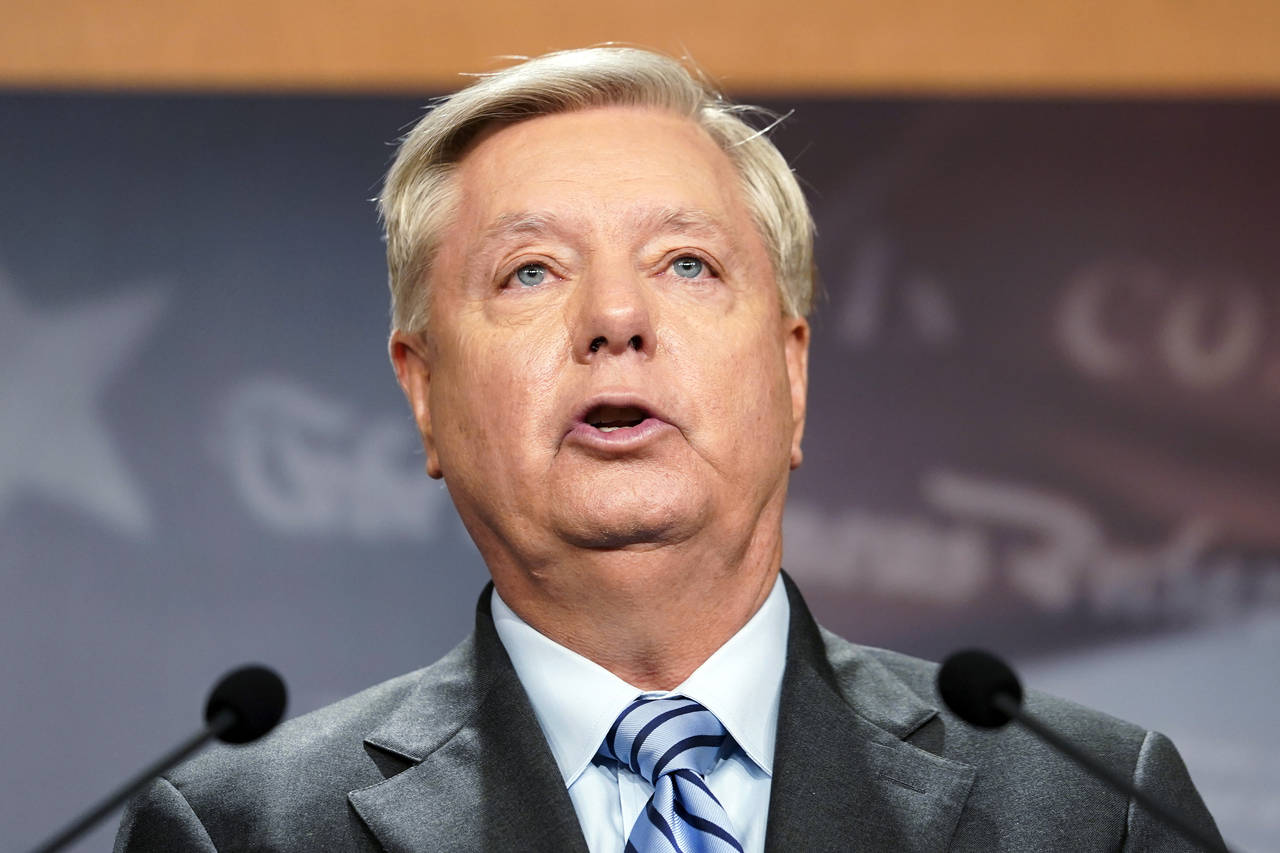 FILE - Sen. Lindsey Graham, R-S.C., speaks during a news conference about refusing Russian annexati...
