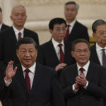 
              FILE - New members of the Politburo Standing Committee, front to back, President Xi Jinping, Li Qiang, Zhao Leji, Wang Huning, Cai Qi, Ding Xuexiang, and Li Xi arrive at the Great Hall of the People in Beijing on Oct. 23, 2022. The world faces the prospect of more tension with China over trade, security and human rights after Xi Jinping awarded himself a third five-year term on Oct. 23, 2022 as leader of the ruling Communist Party. (AP Photo/Ng Han Guan, File)
            