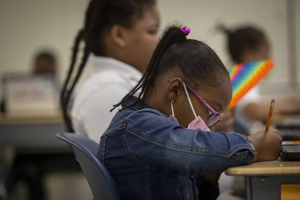FILE - Students work in a classroom at Beecher Hills Elementary School in Atlanta on Friday, Aug. 1...