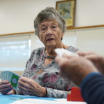
              Barbara Steingaszner, 83, of Alexandria, Va., plays bridge at Hollin Hall Senior Center in Alexandria, Va., Thursday, Oct. 13, 2022. Seniors will get the biggest cost of living increase to Social Security in four decades. (AP Photo/Susan Walsh)
            