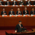 
              Chinese President Xi Jinping delivers a speech at the opening ceremony of the 20th National Congress of China's ruling Communist Party held at the Great Hall of the People in Beijing, China, Sunday, Oct. 16, 2022. China on Sunday opens a twice-a-decade party conference at which leader Xi Jinping is expected to receive a third five-year term that breaks with recent precedent and establishes himself as arguably the most powerful Chinese politician since Mao Zedong. (AP Photo/Mark Schiefelbein)
            