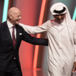 
              FILE - FIFA President Gianni Infantino, left, and Emir of Qatar Sheikh Tamim bin Hamad Al Thani leave the stage before the 2022 soccer World Cup draw at the Doha Exhibition and Convention Center in Doha, Qatar, Friday, April 1, 2022. The first World Cup in the Middle East is only one month away. Qatar has been on an often bumpy 12-year journey that has transformed the nation. (AP Photo/Hassan Ammar, File)
            