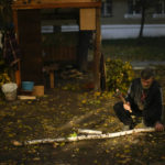 
              A local man cuts pieces of firewood in Kivsharivka, Ukraine, Sunday, Oct. 16, 2022. As temperatures drop below freezing in eastern Ukraine, those who haven't fled from the heavy fighting, regular shelling and months of Russian occupation are now on the threshold of a brutal winter and digging in for the cold months. (AP Photo/Francisco Seco)
            