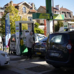 
              Drivers fill their tank in a gas station in Paris, Tuesday, Oct.11, 2022. Shortages which the government says are largely caused by strikes that have hit French fuel refineries are making life difficult for drivers in the Paris region and elsewhere. (AP Photo/Christophe Ena)
            