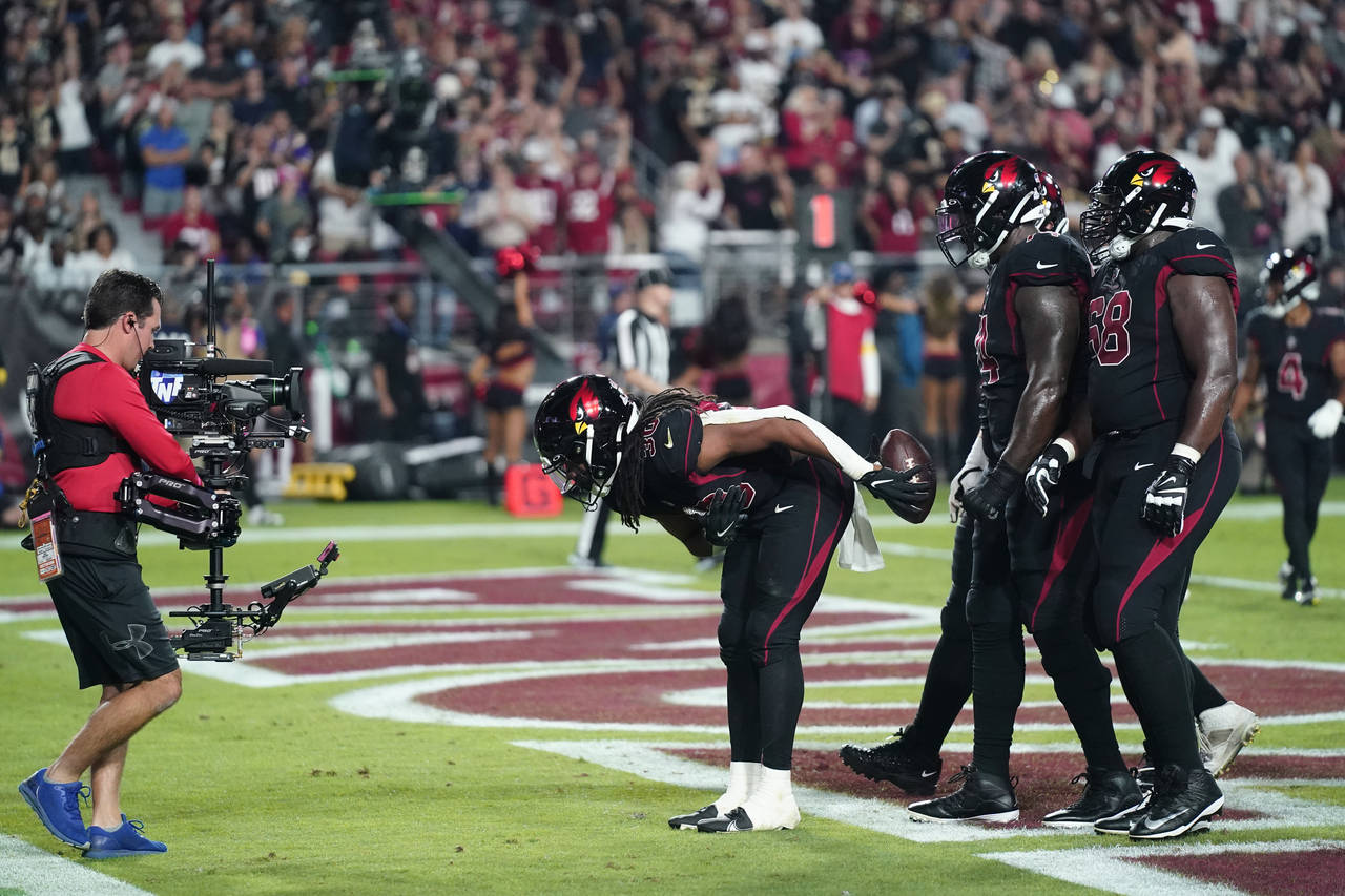 Arizona Cardinals running back Keaontay Ingram (30) celebrate his touchdown during the first half o...