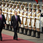 
              FILE - Chinese President Xi Jinping, left, and Russian President Vladimir Putin review an honor guard during a welcoming ceremony at the Great Hall of the People in Beijing on June 25, 2016. Chinese President Xi Jinping was the son of a communist revolutionary leader, a victim of the Cultural Revolution and a provincial leader who promoted economic growth before ascending to the very top a decade ago. (AP Photo/Mark Schiefelbein, File)
            