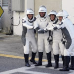 SpaceX Crew5 astronauts, from left, Anna Kikina, of Russia, Josh Cassada, Nicole Mann, and Koichi Wakata, of Japan, pose for a photo as they leave the Operations and Checkout building before heading to Launch Pad 39-A at the Kennedy Space Center in Cape Canaveral, Fla., for a mission to the International Space Station Wednesday, Oct. 5, 2022. (AP Photo/John Raoux)