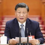 
              In this photo released by Xinhua News Agency, Chinese President Xi Jinping presides over a preparatory meeting ahead of the 20th National Congress of the Communist Party of China held at the Great Hall of the People in Beijing on Saturday, Oct. 15, 2022. China on Sunday is opening a twice-a-decade party conference at which leader Xi Jinping is expected to receive a third five-year term that breaks with recent precedent and establishes himself as arguably the most powerful Chinese politician since Mao Zedong. (Ju Peng/Xinhua via AP)
            