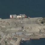
              In this Planet Labs satellite image, the cargo ship Laodicea is docked at a port in Feodosia, Crimea, on July 11, 2022. Two weeks later, when it arrived at the Lebanese port city Tripoli, a manifest falsely claimed the barley and wheat flour in its hold was loaded at a small Russian port on the other side of the Black Sea. (Planet Labs via AP)
            