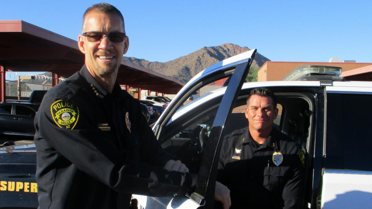 Outgoing Paradise Valley Police Chief Peter Wingert, left, and Commander Freeman Carney, his succes...
