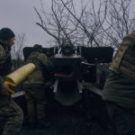 
              Ukrainian soldiers fire an artillery at Russian positions near Bakhmut, Donetsk region, Ukraine, Sunday, Nov. 20, 2022. (AP Photo/LIBKOS)
            
