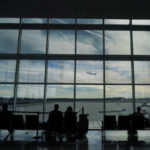 
              Travellers watch as a plane takes off from Hartsfield-Jackson Atlanta International Airport in Atlanta, Tuesday, Nov. 22, 2022. (AP Photo/Brynn Anderson)
            