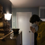 
              Resident priest Genmyo Jana Zeedyk bows before a Buddha statue during a Sunday practice at the Anchorage Zen Community in Anchorage, Alaska, Sunday, Oct. 9, 2022. The Anchorage Zen Community is influenced by the northernmost state's seasonal rhythms that include long, dark winters as well as short summers when the sun only dips below the horizon for brief stretches, said Zeedyk, who has been the resident priest for more than a decade. (AP Photo/Jae C. Hong)
            