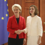 
              European Commission President Ursula von der Leyen, left, shakes hands with Moldovan President Maia Sandu after a joint press conference in Chisinau, Moldova, Thursday, Nov. 10, 2022. (AP Photo/Aurel Obreja)
            