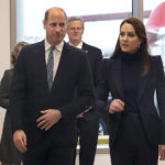 
              Britain's Prince William and Kate, Princess of Wales, arrive at Boston Logan International Airport, Wednesday, Nov. 30, 2022, in Boston. They were met by Massachusetts Gov. Charlie Baker, rear, and first lady Lauren Baker. The Prince and Princess of Wales are making their first overseas trip since the death of Queen Elizabeth II in September. (John Tlumacki/The Boston Globe via AP, Pool)
            