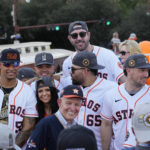 
              Jim "Mattress Mack" McIngvale, foreground, a prolific Texas gambler, and the Houston Astros players gather before a victory parade for the Houston Astros' World Series baseball championship Monday, Nov. 7, 2022, in Houston. (AP Photo/David Phillip)
            