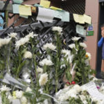 
              A man weeps as he pays tribute to victims of a deadly accident following Saturday night's Halloween festivities on a street near the scene in Seoul, South Korea, Tuesday, Nov. 1, 2022.  South Korean police investigated on Monday what caused a crowd surge that killed more than 150 people during Halloween festivities in Seoul in the country’s worst disaster in years. (AP Photo/Ahn Young-joon)
            