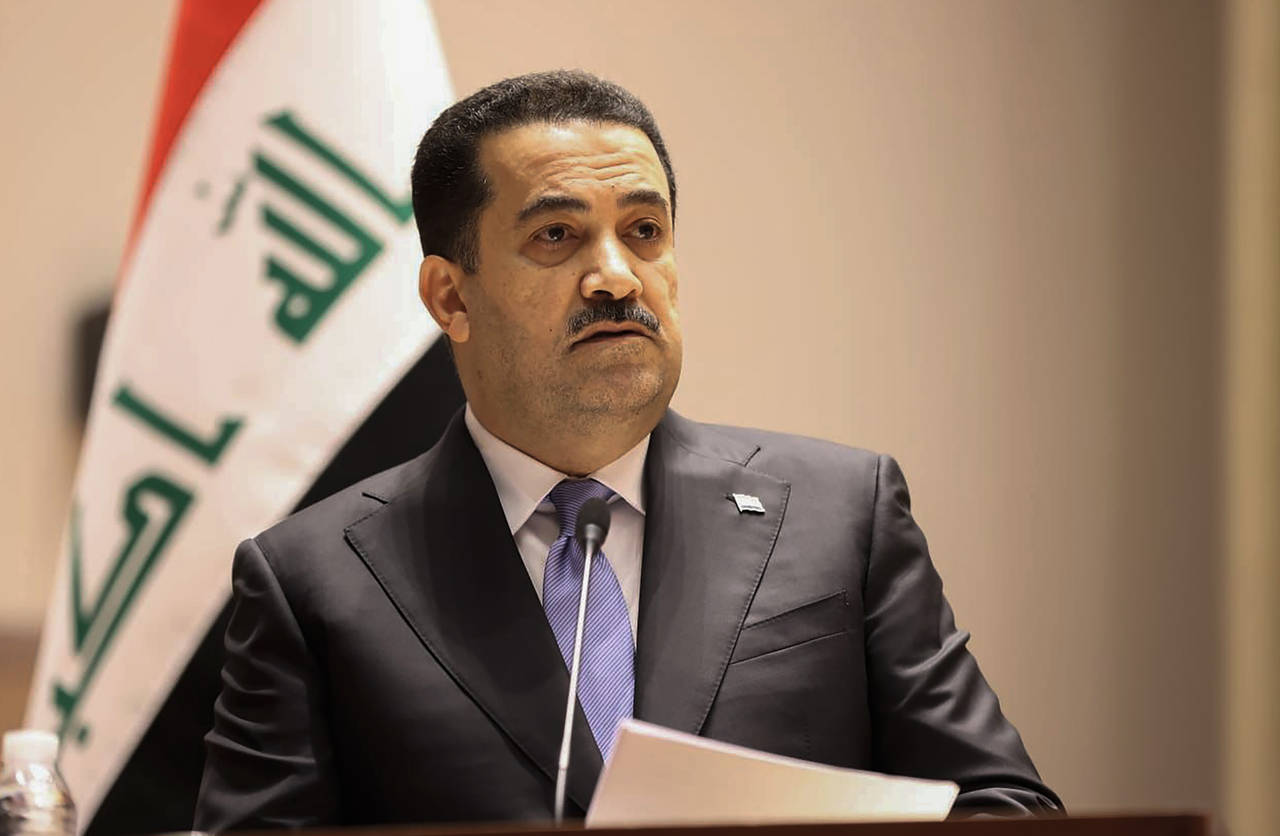 This photo provided by Iraqi Parliament Media Office shows Mohammed Shia al-Sudani speaking during ...