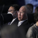 
              Xie Zhenhua, China's special envoy for climate, sits during a break in a closing plenary session at the COP27 U.N. Climate Summit, Sunday, Nov. 20, 2022, in Sharm el-Sheikh, Egypt. (AP Photo/Peter Dejong)
            
