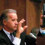 
              FILE - Sen. Joe Biden, D-Del., chairman of the Senate Judiciary Committee, holds a TEC-9 semi-automatic pistol during a hearing of the committee on Capitol Hill, Aug. 3, 1993, as the committee holds hearings on combating the proliferation of assault weapons. (AP Photo/Barry Thumma, File)
            