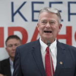 
              FILE - Idaho Gov. Brad Little declares victory in the gubernatorial primary during the Republican Party's primary election celebration, May 17, 2022, in Boise, Idaho. Little is seeking reelection in the Nov. 8, 2022 election. (AP Photo/Kyle Green, File)
            